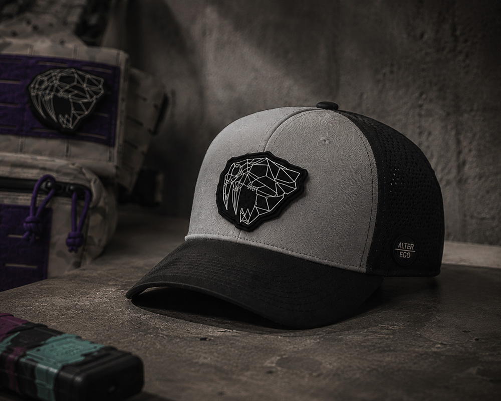 newfangled-tactical-hat-warehouse Newfangled Tactical headwear in a dim lit warehouse